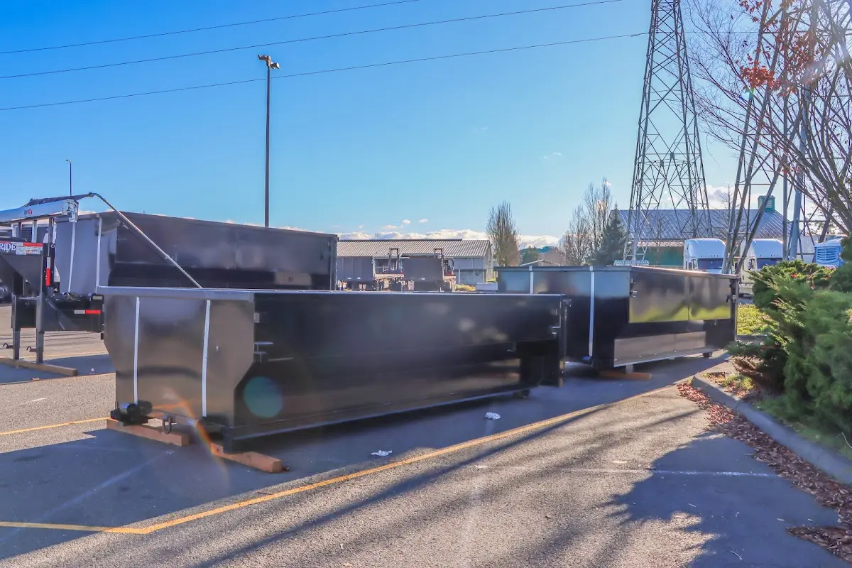 Roll-off dumpster ready for waste disposal at job site for Construction Dumpster Rental in Newport